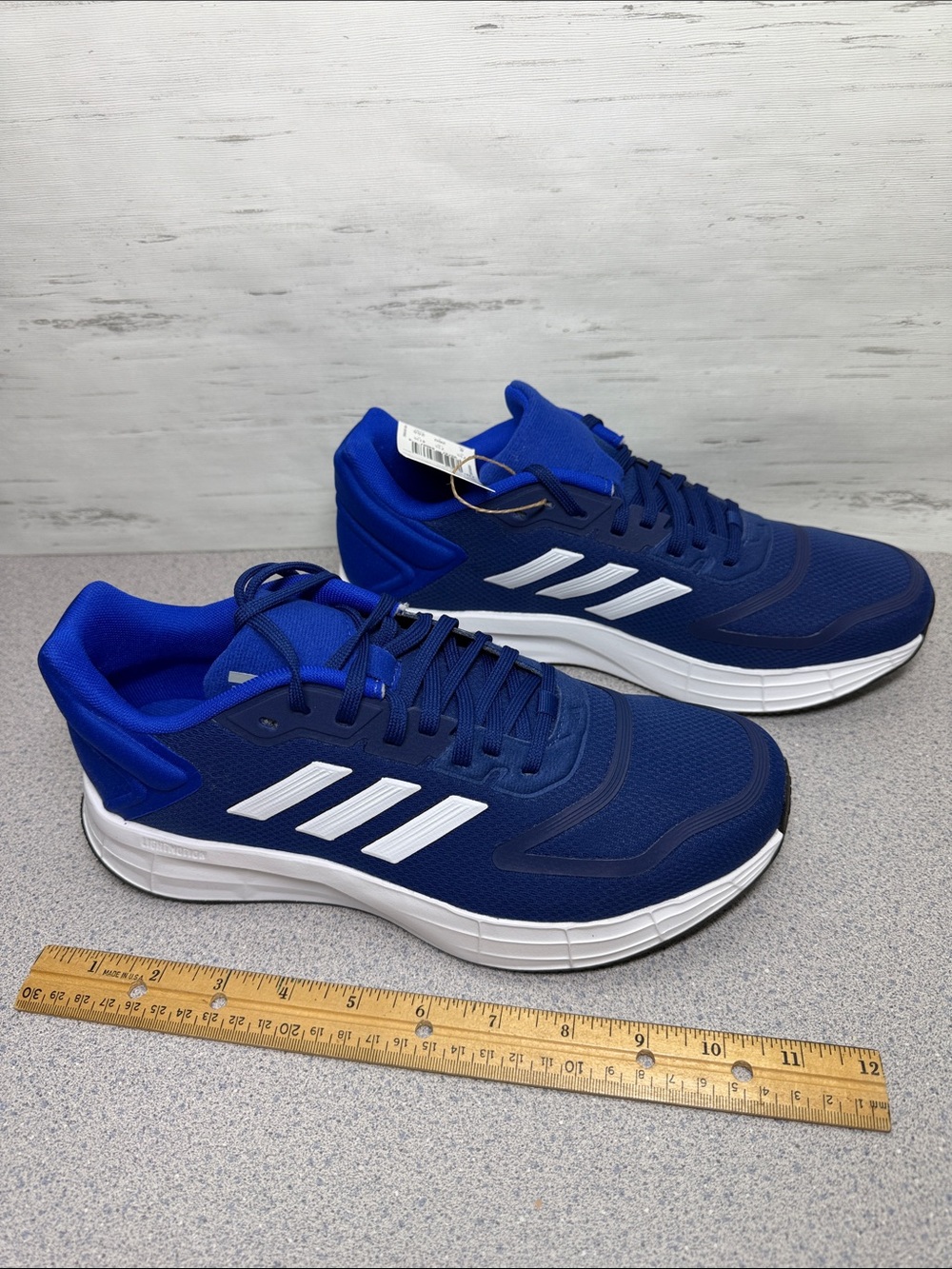 adidas Navy Blue Athletic Sneakers with White Stripes